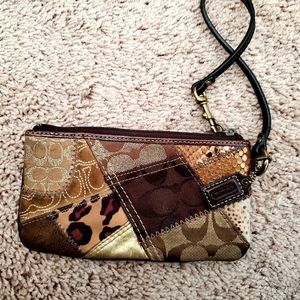 Coach leopard and multiprint wristlet